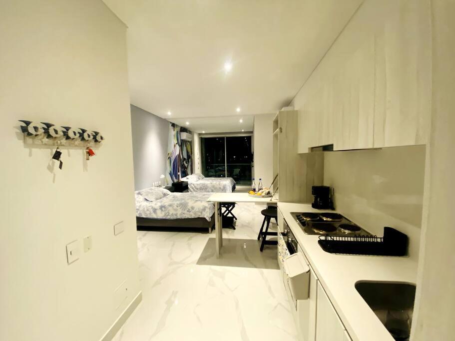 Espectacular Apto Loft Nuevo- Frente Al Hilton Pozos Colorados Apartment *