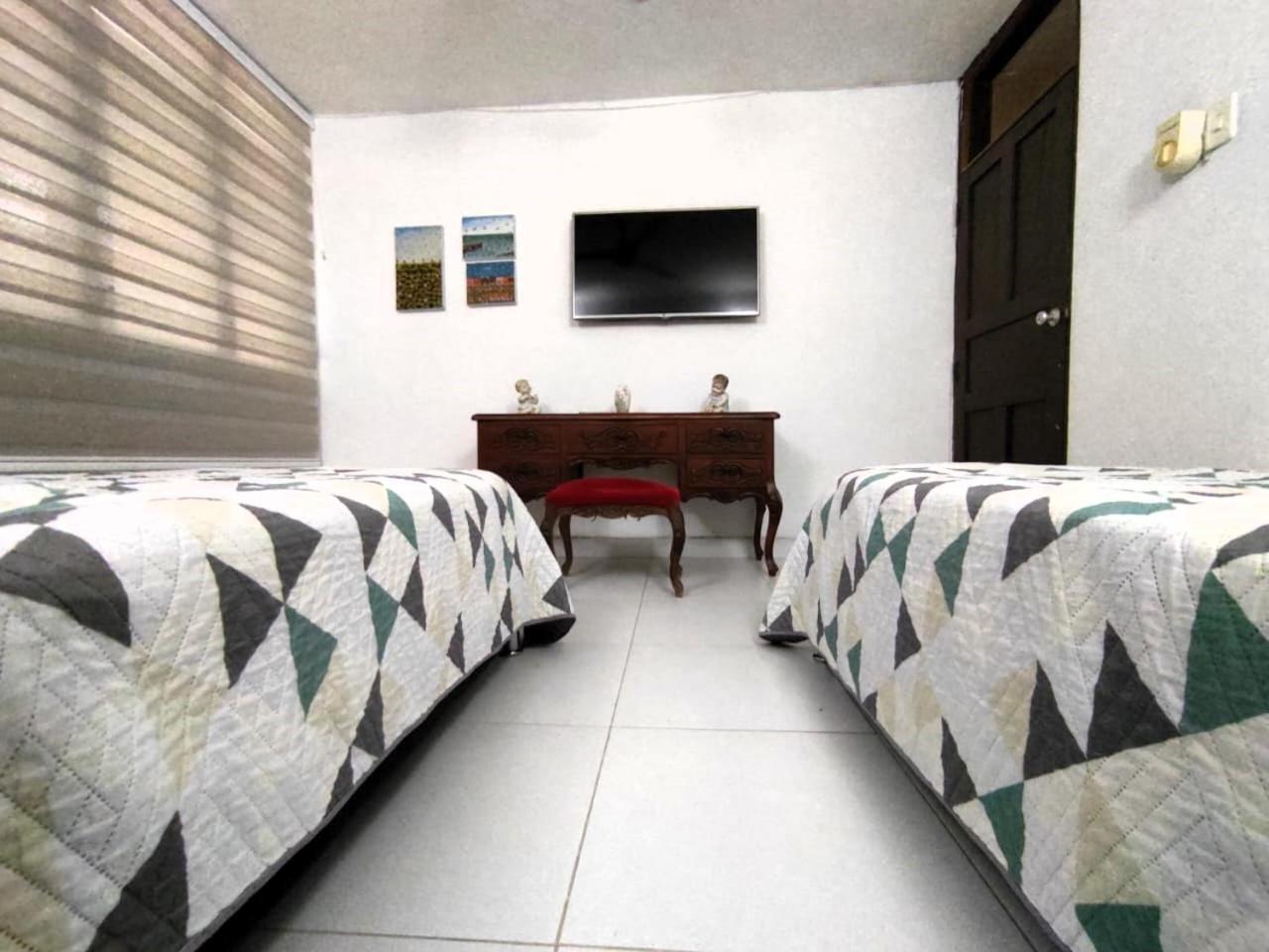 Confortables A Pocos Metros Del Mar Habitación en casa particular